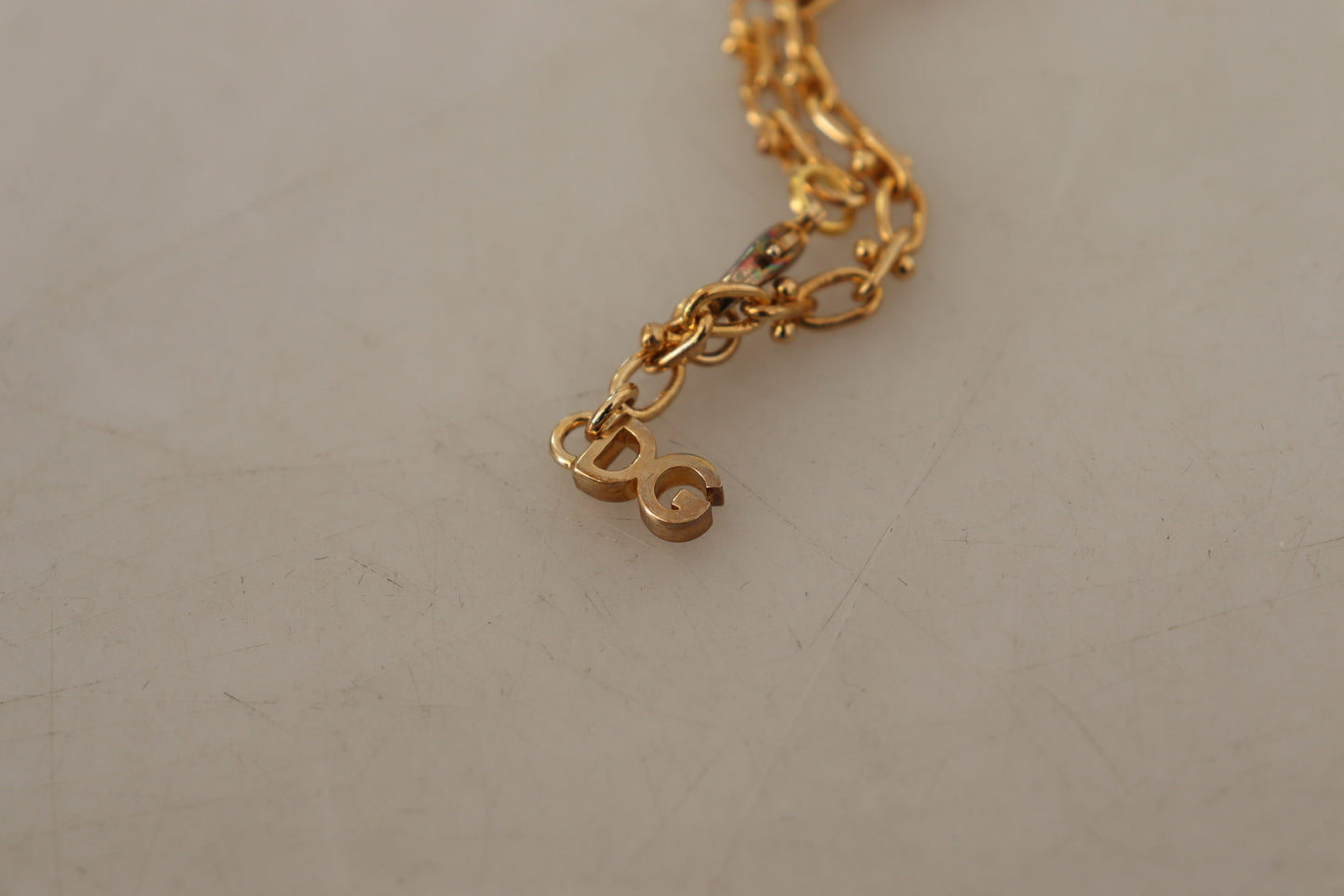 Gold Tone Brass Logo Charm Necklace