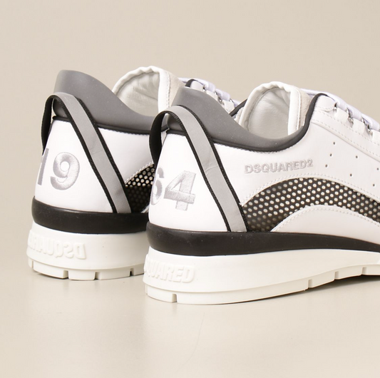 Sleek White Leather Sneakers with Metal Plaque