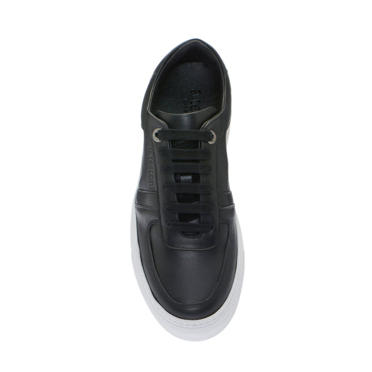 Elegant Black Leather Sneakers With White Soles